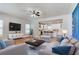 Inviting living room with modern decor, hardwood floors, and an open layout to the kitchen at 870 Gaston Sw St, Atlanta, GA 30310