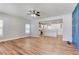 Open concept living room and kitchen area with hardwood floors and modern finishes at 870 Gaston Sw St, Atlanta, GA 30310