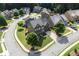 Aerial view of a neighborhood showcasing a beautifully landscaped property on a corner lot at 218 Ballymore Lane Ln, Acworth, GA 30102