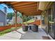 Backyard patio with outdoor seating area and ceiling fans at 218 Ballymore Lane Ln, Acworth, GA 30102