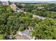 Aerial view of home in Atlanta, Georgia surrounded by trees at 28 Peachtree Hills Ne Ave, Atlanta, GA 30305