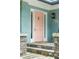 Charming front door of home featuring blue brick and a peach colored front door at 28 Peachtree Hills Ne Ave, Atlanta, GA 30305