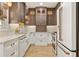 Modern kitchen with stainless steel appliances, white cabinets, and stylish countertops at 28 Peachtree Hills Ne Ave, Atlanta, GA 30305