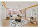 Cozy living room with wood floors, bright walls, and a view into the modern kitchen at 28 Peachtree Hills Ne Ave, Atlanta, GA 30305