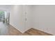 Entrance with hardwood flooring, white walls, light fixtures and nature provides a peaceful welcome at 3236 Henderson Mill Rd # 1, Chamblee, GA 30341