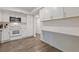 Kitchen featuring all-white cabinetry, subway tile backsplash, and stainless steel appliances at 3236 Henderson Mill Rd # 1, Chamblee, GA 30341