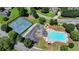 Aerial view of the community pool, tennis courts, and playground at 5385 Spotted Fawn Ct, Suwanee, GA 30024