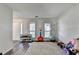 Bright living room with hardwood floors and natural light at 5385 Spotted Fawn Ct, Suwanee, GA 30024