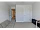 Bright and airy room with couch and multiple doors at 5385 Spotted Fawn Ct, Suwanee, GA 30024