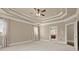 Spacious carpeted bedroom with trey ceilings, and large windows allowing for plenty of natural light at 2845 Echols Road Rd, Cumming, GA 30041