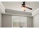 Bedroom with a ceiling fan, crown moulding and a large window at 2845 Echols Road Rd, Cumming, GA 30041