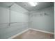 Walk-in closet featuring wire shelving for organized storage and neutral walls at 2845 Echols Road Rd, Cumming, GA 30041
