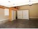 Attached garage with white storage cabinets at 2845 Echols Road Rd, Cumming, GA 30041