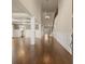 Open-concept living room with beautiful hardwood floors, high ceilings, and elegant architectural details at 2845 Echols Road Rd, Cumming, GA 30041