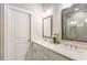 Bathroom featuring double sinks, granite counters, and walk-in shower at 4358 Parkside Pl, Atlanta, GA 30342