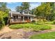 Spacious backyard with a wooden deck that's perfect for entertaining friends and Gathering at 2628 Tanglewood Rd, Decatur, GA 30033