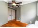 Open bedroom area with hardwood floors, crown molding, and double closets for ample storage space at 2628 Tanglewood Rd, Decatur, GA 30033