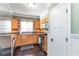 Functional kitchen featuring stainless steel appliances, wood cabinets, and plenty of natural light at 2628 Tanglewood Rd, Decatur, GA 30033