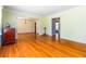 Hardwood floors flow through an open floor plan connecting living areas for easy living at 2628 Tanglewood Rd, Decatur, GA 30033