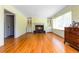 Elegant living room with hardwood floors, fireplace, and built-in cabinets offering ample storage at 2628 Tanglewood Rd, Decatur, GA 30033
