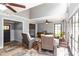 Sitting room with slate-look tile floor, neutral walls, and lots of windows at 2628 Tanglewood Rd, Decatur, GA 30033