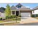 Charming brick home with a two-car garage and beautifully landscaped front yard at 113 Overlook Ridge Way Way, Canton, GA 30114