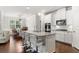 Modern kitchen with white cabinets, granite countertops, and stainless steel appliances at 113 Overlook Ridge Way Way, Canton, GA 30114