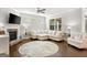 Inviting living room featuring a fireplace, hardwood floors, and comfortable seating at 113 Overlook Ridge Way Way, Canton, GA 30114