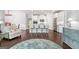 Open-concept living area with seamless flow between kitchen, dining, and living spaces at 113 Overlook Ridge Way Way, Canton, GA 30114