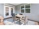 Cozy patio area with outdoor dining set, perfect for relaxing and entertaining at 113 Overlook Ridge Way Way, Canton, GA 30114