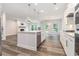 Open kitchen with a large island, stainless steel appliances, and modern cabinetry at 129 Academy Ln, Canton, GA 30114