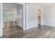 Bright living room featuring modern flooring and neutral walls at 129 Academy Ln, Canton, GA 30114