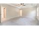 An expansive main bedroom with tray ceilings and lots of natural light at 129 Academy Ln, Canton, GA 30114