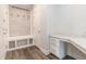 Functional mudroom with built-in bench, hooks, and workspace, great for organization at 129 Academy Ln, Canton, GA 30114