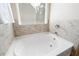 Relax and unwind in this luxurious soaking tub, perfect for a spa-like experience at home at 207 Cross Rd, Acworth, GA 30102