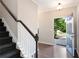 Welcoming entryway with hardwood floors and staircase at 207 Cross Rd, Acworth, GA 30102
