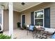 Cozy front porch with stylish seating and decor at 207 Cross Rd, Acworth, GA 30102