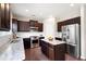 Spacious kitchen with stainless steel appliances and center island at 207 Cross Rd, Acworth, GA 30102