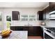 Contemporary kitchen with granite counters, an island, and stainless steel appliances at 207 Cross Rd, Acworth, GA 30102