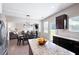Bright kitchen with granite countertops, stainless appliances, and view to dining area and backyard at 207 Cross Rd, Acworth, GA 30102