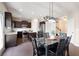 Modern eat-in kitchen featuring a marble table, an island and stainless steel appliances at 207 Cross Rd, Acworth, GA 30102