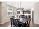 Eat-in kitchen area with dark cabinets, an island and stainless steel appliances at 207 Cross Rd, Acworth, GA 30102