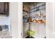 Well-organized pantry with wire shelving, containers, and food items for convenient storage and accessibility at 207 Cross Rd, Acworth, GA 30102
