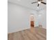 Empty bedroom that opens to a bathroom with a double vanity and a doorway to another room at 332 Mount Zion Rd, Oxford, GA 30054