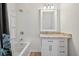 Bathroom with a granite countertop, a white vanity, shower and tub combination at 332 Mount Zion Rd, Oxford, GA 30054