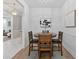 Cozy breakfast nook with wood table, chairs, and natural light from the nearby living room at 332 Mount Zion Rd, Oxford, GA 30054