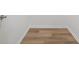 Walk-in closet showing wood-look flooring and white trim at 332 Mount Zion Rd, Oxford, GA 30054