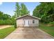 Charming exterior of home with beige siding and a well-maintained driveway at 332 Mount Zion Rd, Oxford, GA 30054