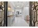 Elegant foyer with a view into the kitchen and hallway, showcases bright, open floor plan at 332 Mount Zion Rd, Oxford, GA 30054