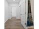Hallway with wood floors and white trim throughout at 332 Mount Zion Rd, Oxford, GA 30054